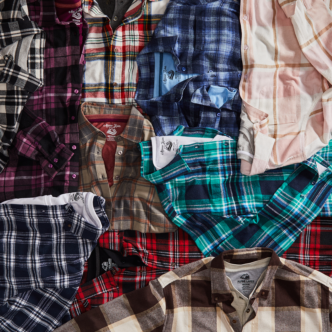 long sleeved flannel shirts professionally displayed in a swirl pattern by an apparel photo stylist
