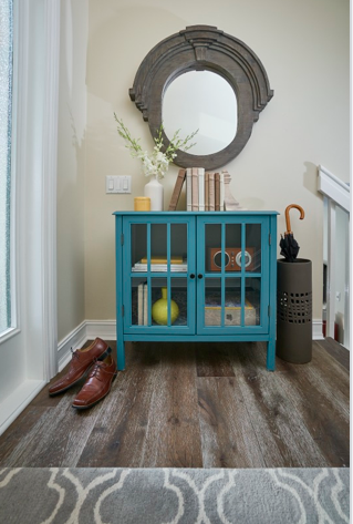 Accent table at the top of the stairs