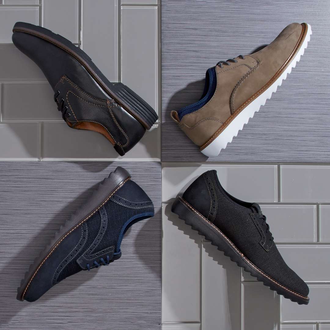 Assorted men's dress shoes that have been styled by a footwear photo stylist