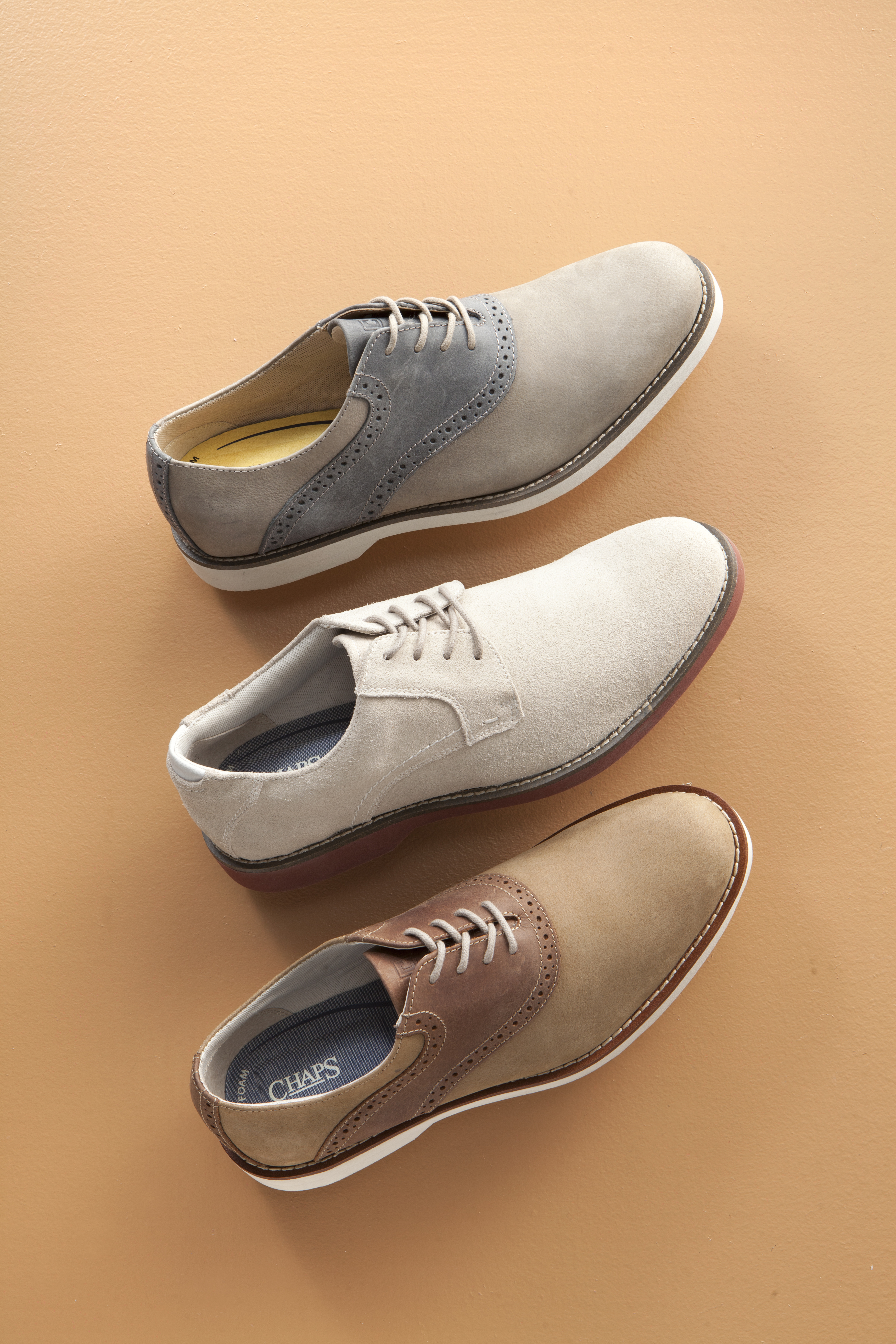 Assorted Chaps dress shoes that have been styled by a professional footwear photo stylist