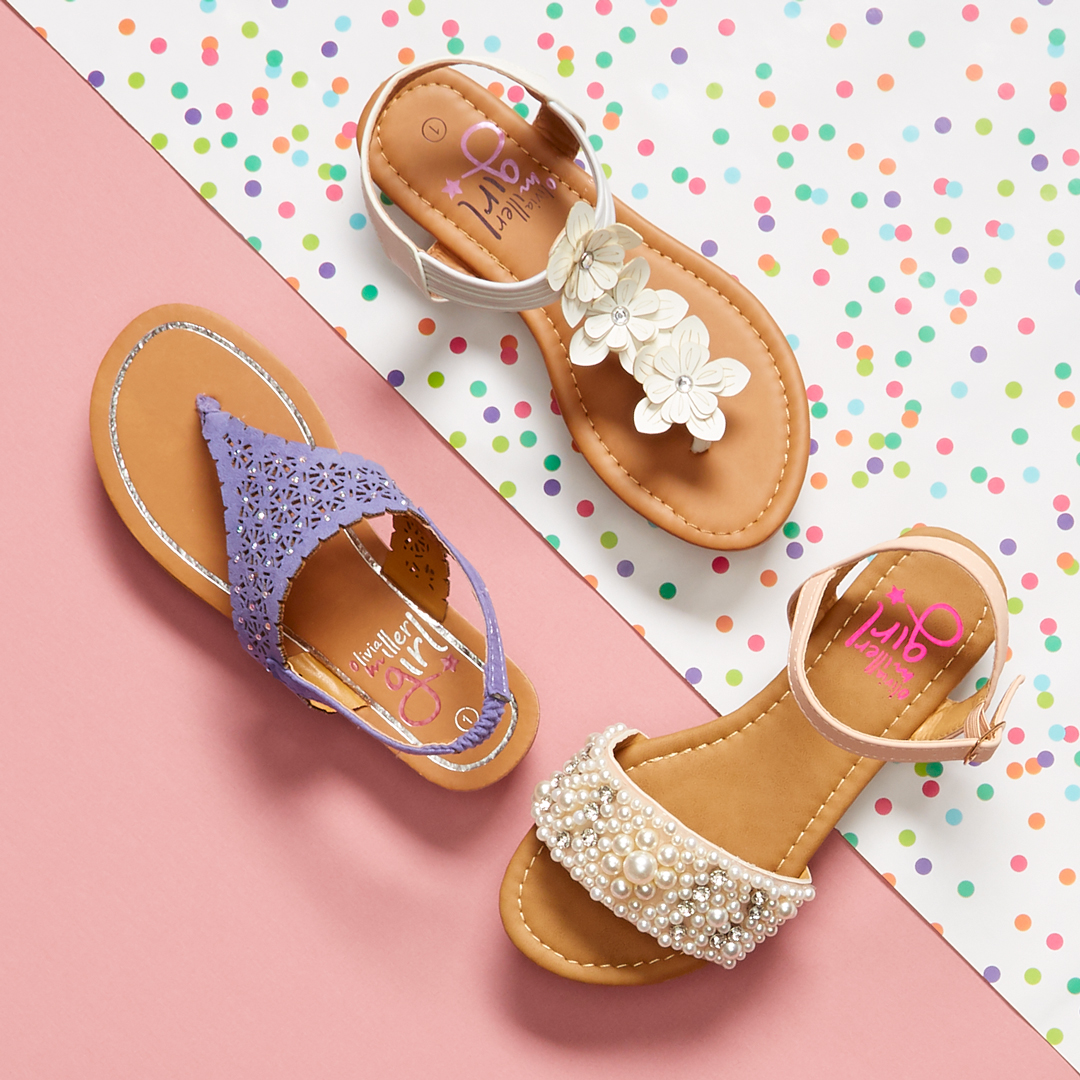 Assorted girls sandals that have been professionally styled by a footwear photo stylist