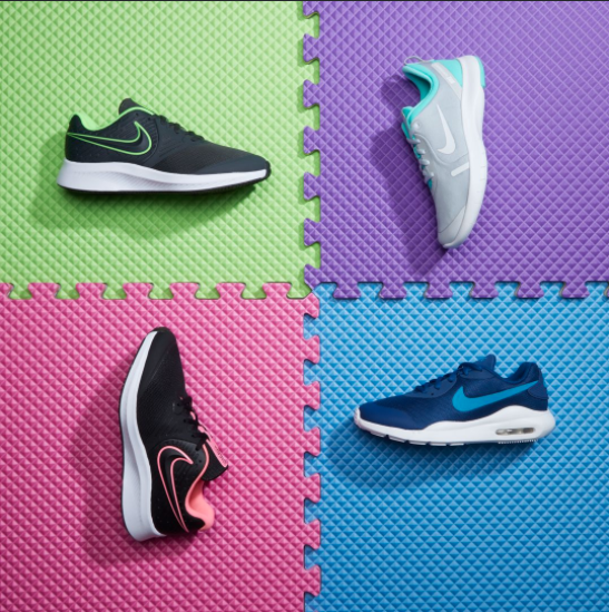 Assorted Nike sneakers that have been professionally styled by a footwear photo stylist
