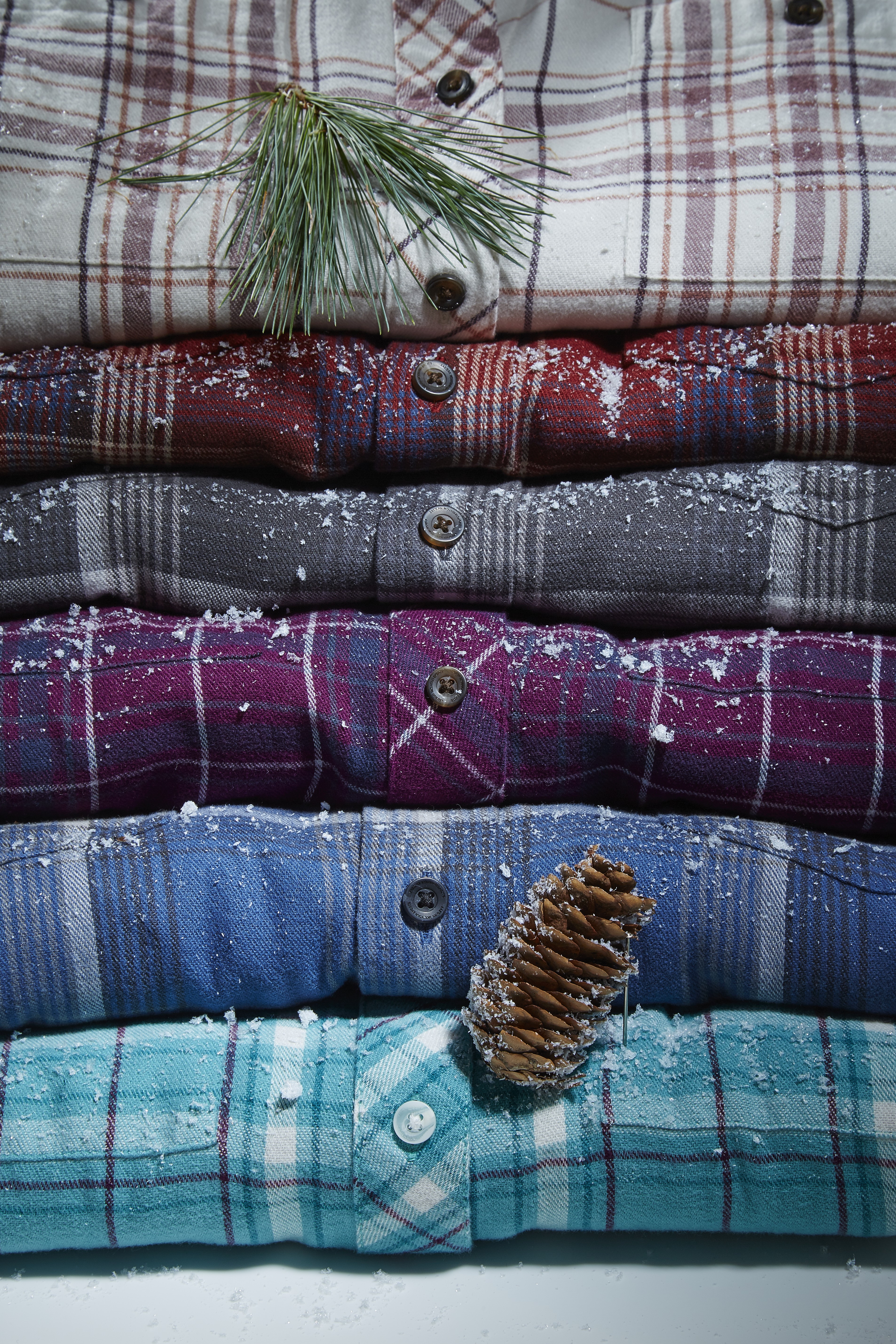 long sleeved flannel shirts professionally displayed by an apparel photo stylist